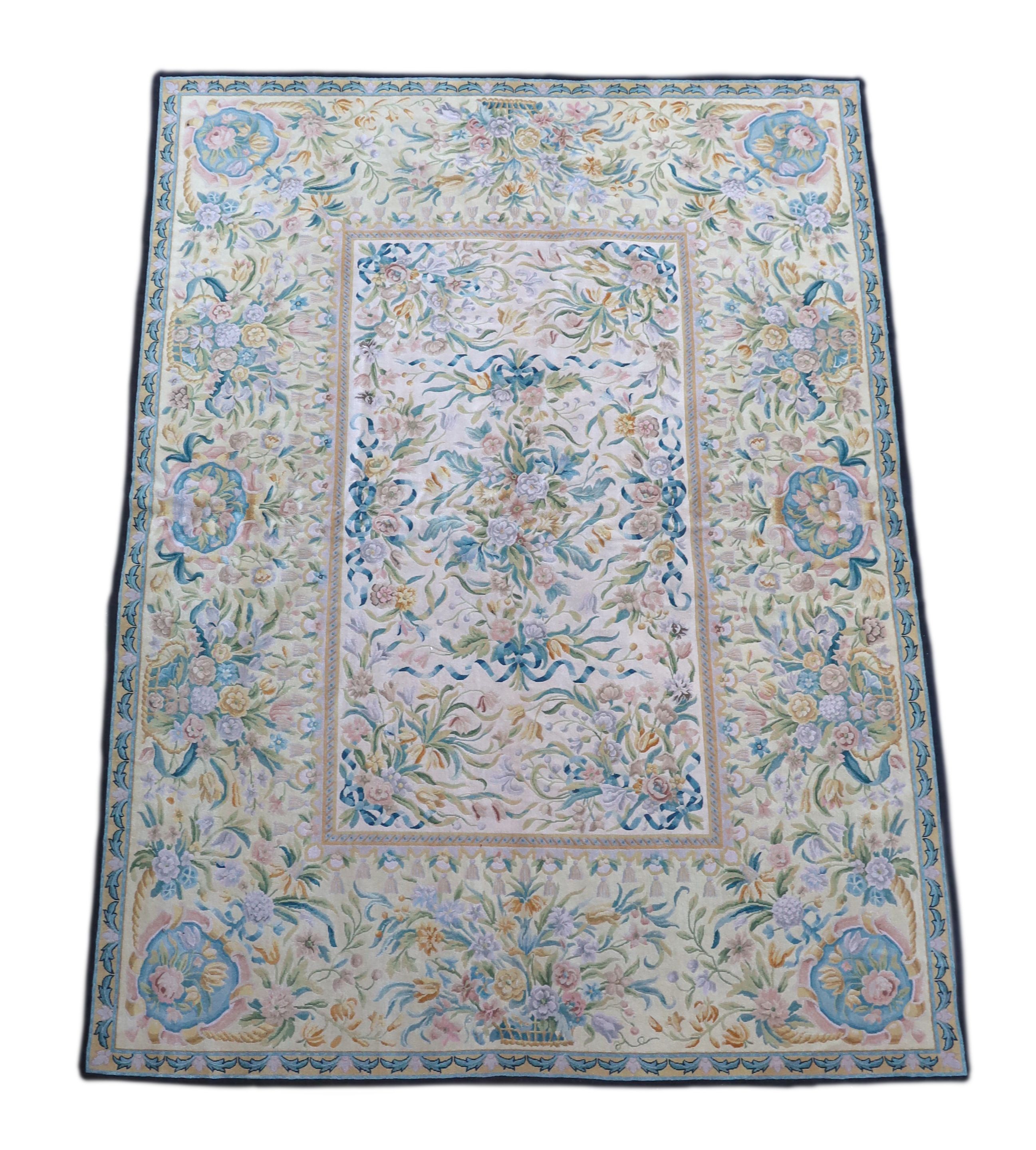 An Aubusson style ivory ground carpet, 372 x 274cm.